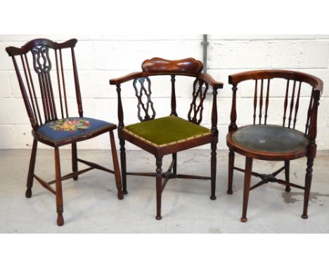 A late 19th early 20th century mahogany inlaid corner chair, scrolling back and pierced splats on turned legs and cross stret