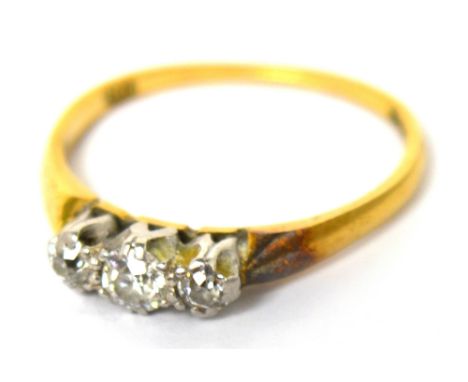 A 9ct gold three stone diamond ring, size L, approx 2.5g.