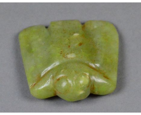 A Chinese carved jade eagle pendant with ring holes to the reverse, width 5.5cm.
