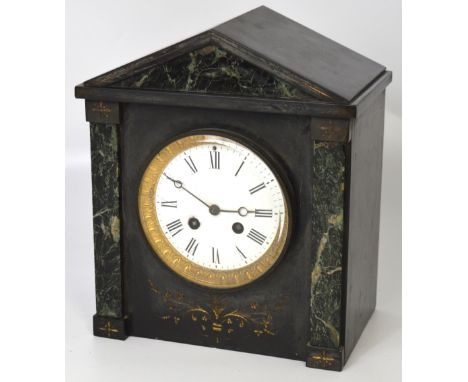 A 19th century French black slate eight day mantel clock, enamel dial set with Roman numerals, height 27cm.