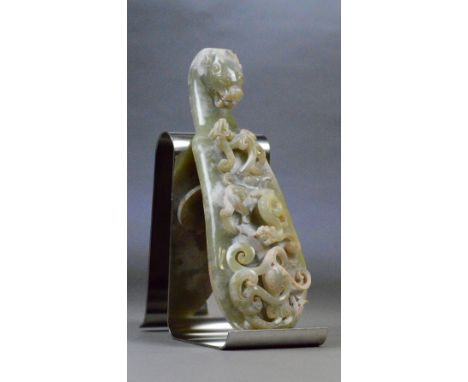 A Chinese included jade plaque in the form of a belt hook with stylised dragon handle and shaped main body set with chilong, 