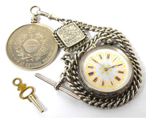 A small Continental silver open face pocket watch, enamel dial set with Roman numerals and gilt decoration on silver Albert c