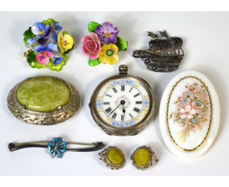 A Noritake ceramic brooch, a white metal brooch with central hardstone and a pair of matching earrings, a white metal filigre