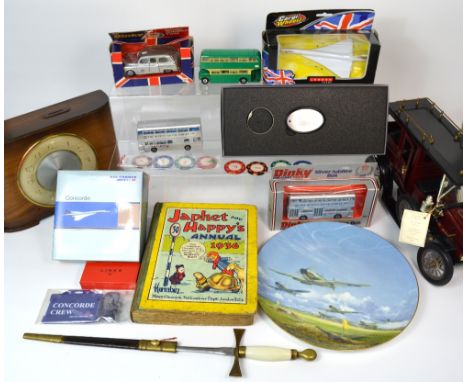 A collectors lot comprising Concord memorabilia to include scale model Concords, badges etc, a boxed limited edition Coalport