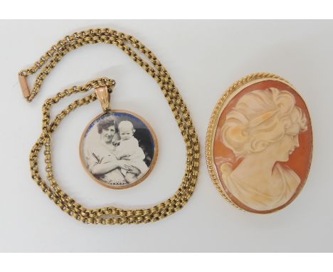 A 9ct gold mounted shell cameo, together with a 9ct vintage chain, length 42cm, and locket, weight combined 18.3gms Condition