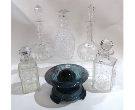 A pair of vine etched and cut decanters, a triple ring neck decanter, two others and a cloud glass centrepiece Condition Repo
