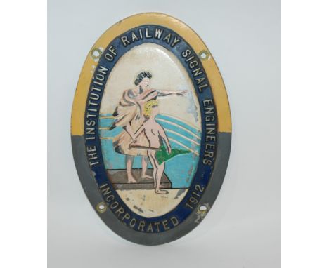 An oval cast metal The Institution of Railway Signal Engineers, Incorporated 1912 painted railway plaque, 30cm and another Mi