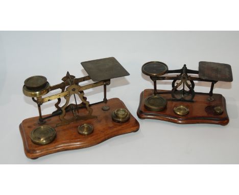 Two sets of vintage postal scales with associated weights Condition Report: Available upon request