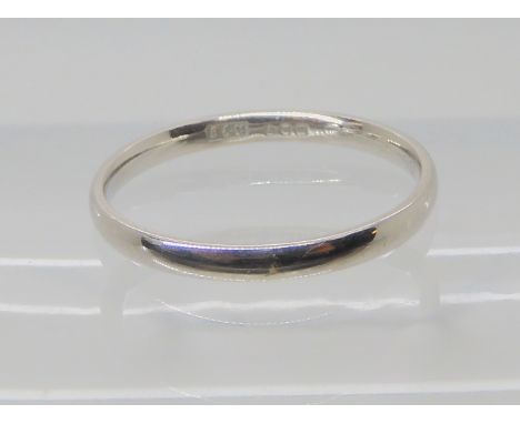 A platinum wedding ring size N1/2, weight 2.4gms Condition Report: Available upon request