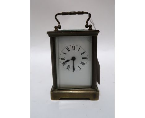 A R &amp; Co French carriage clock with roman numerals Condition Report: has key and winds. Enamel cracked on the dial. 