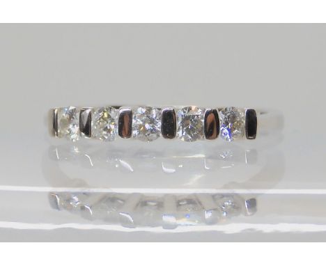 An 18ct white gold five stone diamond ring set with estimated approx 0.36cts of brilliant cut diamonds, size O/2, weight 2.6g