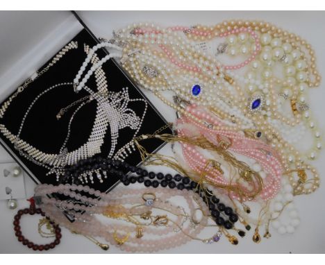 A good string of amethyst beads, rose quartz beads, faux pearls, a fish brooch etc Condition Report: Not available for this l