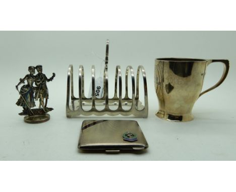 A lot comprising a silver toast rack, Sheffield 1930, a silver christening mug, London 1937, a figural menu holder, Birmingha