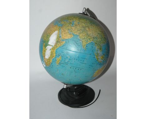 A modern globe and modern desk lamp Condition Report: Available upon request