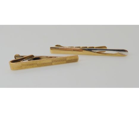 Two 9ct gold tie clips weight combined 9.9gms Condition Report: Available upon request