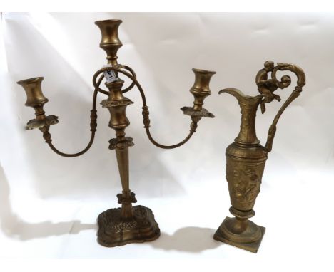 A gilt painted candelabra and a decorative ewer Condition Report: Available upon request