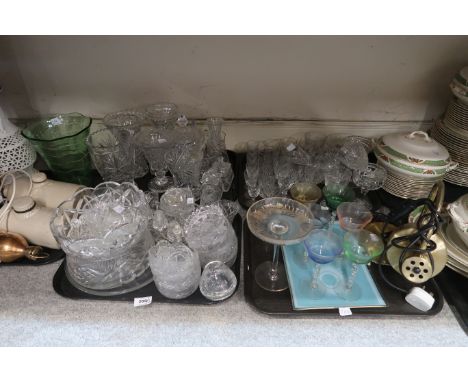 A quantity of cut glass and crystal, including drinking glasses, bowls, dishes, vases, a set of parti-coloured drinking glass