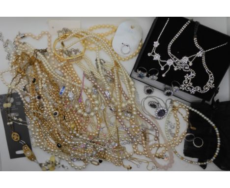 A faux pearl necklace, and rings by Danish designers Pilgrim, cz rings and collection of vintage and fashion jewellery Condit