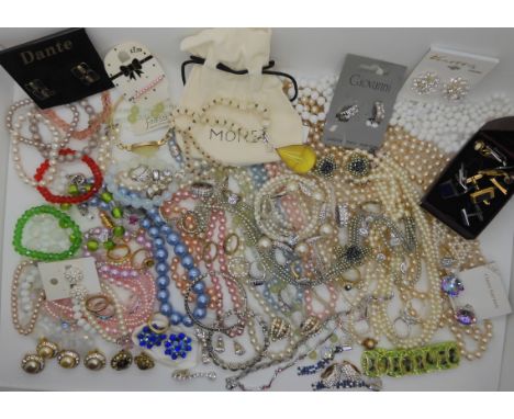 A collection of vintage and fashion jewellery to include items by Monet, faux pearls etc Condition Report: Not available for 