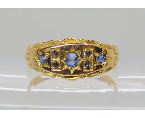 A bright yellow metal sapphire and rose cut diamond ring, size M, weight 3gms Condition Report: Available upon request