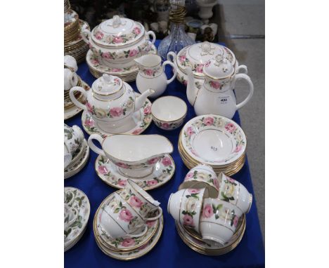 A Royal Worcester Royal Garden Elgar pattern dinner service comprising two tureens, six dinner plates, bowls, cups and saucer