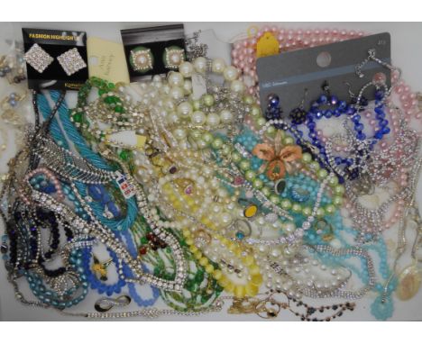 A string of vintage yellow satin glass beads, items by Swarovski, a collection of diamante etc Condition Report: Not availabl