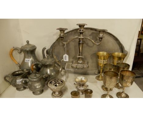 A lot comprising a pewter tea service, tray, goblets, EP candelabra etc Condition Report: Available upon request