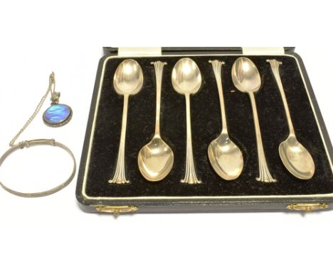 VARIOUS ANTIQUE SILVER ITEMS   To include cased silver teaspoons, a butterfly wing pendant with chain and a silver childs ban