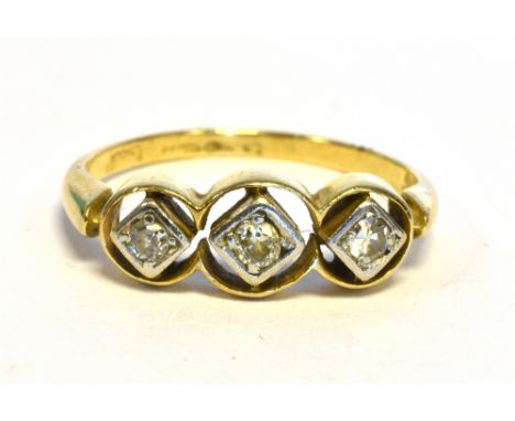 EDWARDIAN 18CT GOLD &amp; DIAMOND RING  Three platinum grain set cheniers in 18ct gold, open work frames, set with a central 