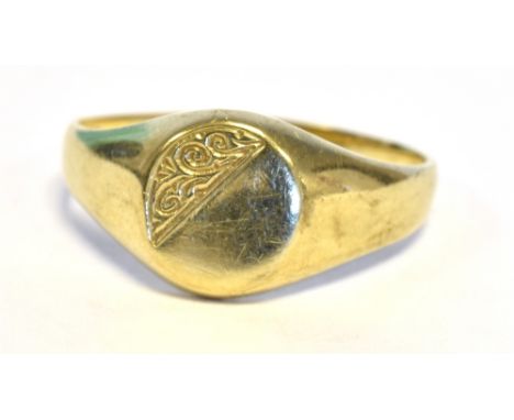 9CT GOLD SIGNET RING  Oval shaped partially engraved signet ring, size V.  Hallmarked 375 London.  Weight 2.1 grams