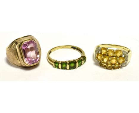 9CT GOLD GEM SET DRESS RINGS  One set with round peridots, and one set with round citrines and single cut diamonds, both ring