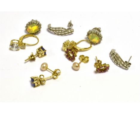 A QUANTITY OF GEM SET EARRINGS  Set in 9ct white and yellow gold and including, fresh water pearls, rubies, diamonds, opal &a