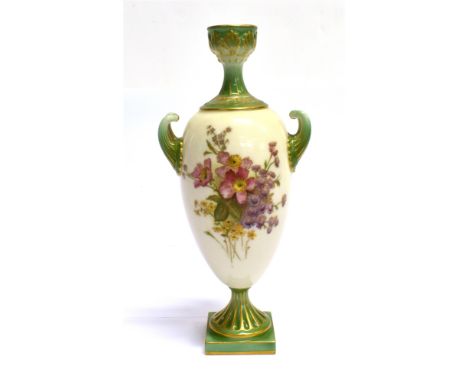 AN EARLY 20TH CENTURY ROYAL WORCESTER TWIN HANDLED '2063' PEDESTAL VASE  dated 1903, decorated with floral bouquets on a whit