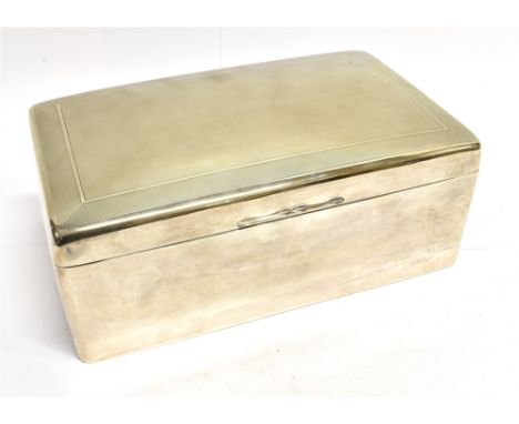 A SILVER LARGE CIGAR BOX WITH AN ENGINE TURNED HINGED COVER plain sides and a later maroon velvet lining, mark of A &amp; J Z