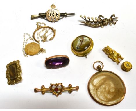 A COLLECTION OF 19TH CENTURY AND LATER JEWELLERY INCLUDING A VICTORIAN SHAPED OBLONG MOURNING BROOCH with a central glazed wo