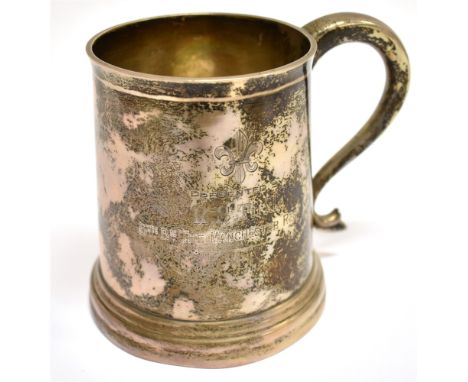 A SILVER PINT MUG WITH A DOUBLE SCROLL HANDLE a moulded rim, a stepped foot-rim and engraved with a presentation inscription,