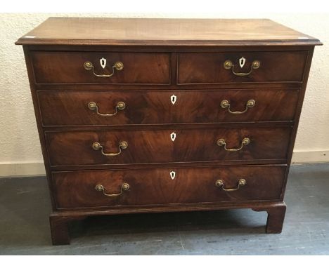 AN 18TH CENTURY MAHOGANY CHEST OF TWO SHORT AND THREE LONG DRAWERS on bracket feet, 105cm wide 55cm deep 89cm high