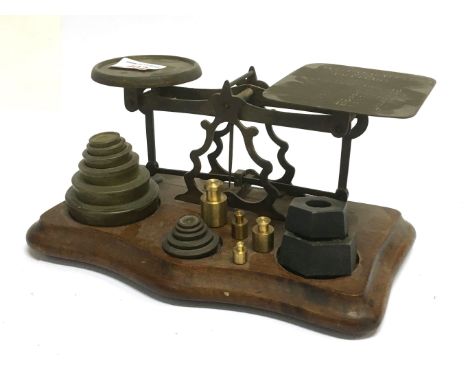 A SET OF VICTORIAN POSTAGE SCALES  together with group of various weights