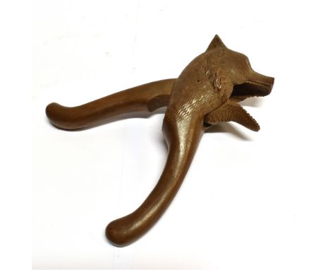 TREEN: A BLACK FOREST STYLE LEVER ACTION NUTCRACKER  realistically modelled as a bears head, 20cm long