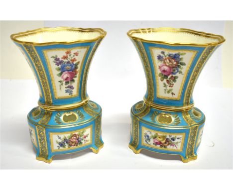 A PAIR OF MINTON VASES  the reserves with painted floral decoration on a turquoise ground, with gilt highlights, 17cm high