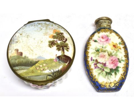 AN ENAMELLED PATCH BOX,  the hinged cover decorated with a landscape scene, 6.5cm diameter; together with a porcelain scent f