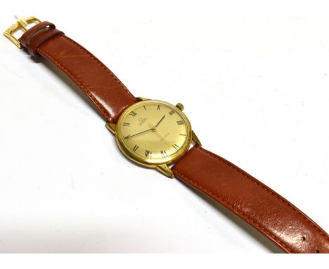 OMEGA, AUTOMATIC, A GENTLEMAN'S GOLD-PLATED AND STAINLESS STEEL ROUND WRIST WATCH, CIRCA 1962 the gilt dial with black roman 