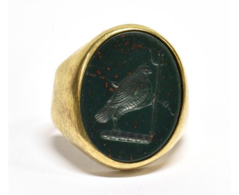 A MODERN GERMAN BLOODSTONE OVAL SIGNET RING the oval bloodstone panel rub-over set between tapering shoulders, on a flat-sect