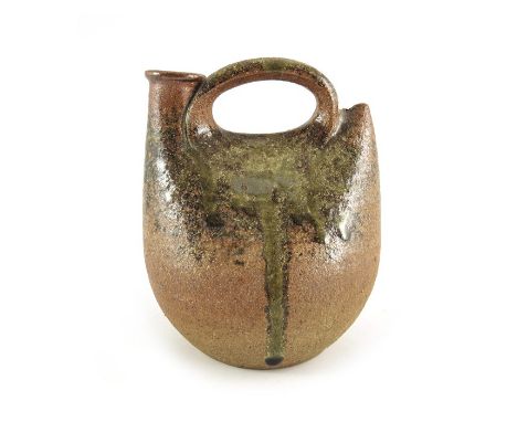 John Leach for Muchelney, a studio pottery cider flagon, sack form with strap handle, green drip glaze, impressed marks, 14cm
