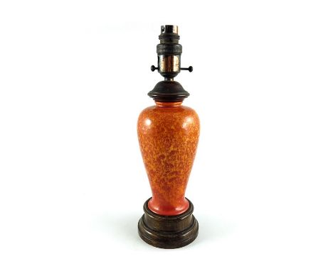 Pilkington, a Royal Lancastrian orange crystalline lamp base, inverse baluster form, on wooden plinth, 34cm high