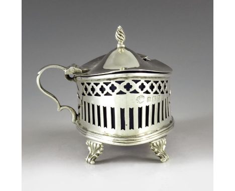 Alexander Clark and Co. Ltd., Birmingham 1917, a George V silver mustard pot, straight sided oval boat form, reticulated reed