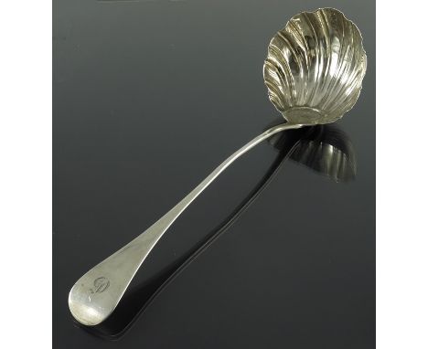 A George III silver ladle, GB, London circa 1760, relief moulded scalloped shell bowl on Old English handle, 33cm long, 4.72o