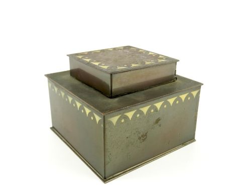 An American Secessionsit style bronzed copper inkwell, K and Co., circa 1910, cuboid form, enamelled with geometric banding o