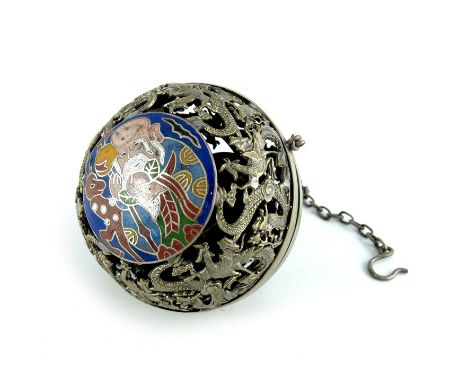 A Chinese reticulated white metal and champlevé enamelled pendulum censer, spherical form, cast with dragons to the body, the