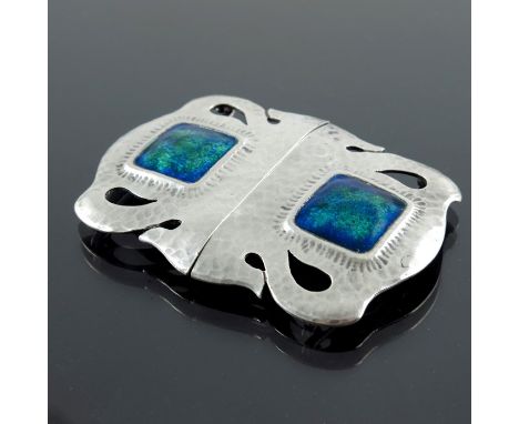 Archibald Knox for Liberty and Co., an Arts and Crafts silver and enamelled belt buckle, Birmingham 1908, planished open tend